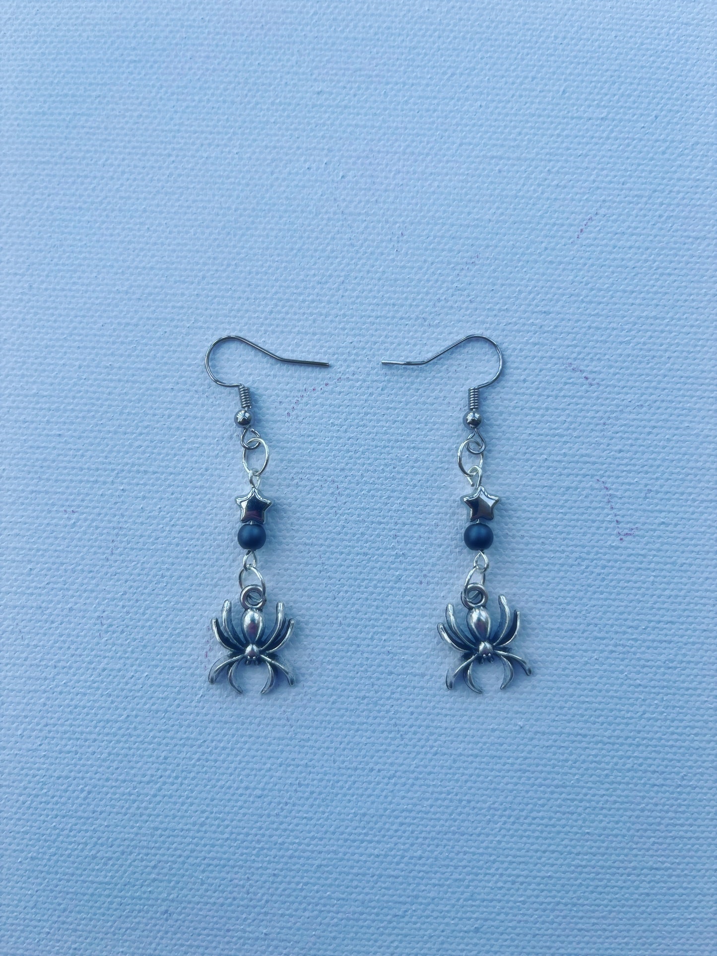 spider star earrings